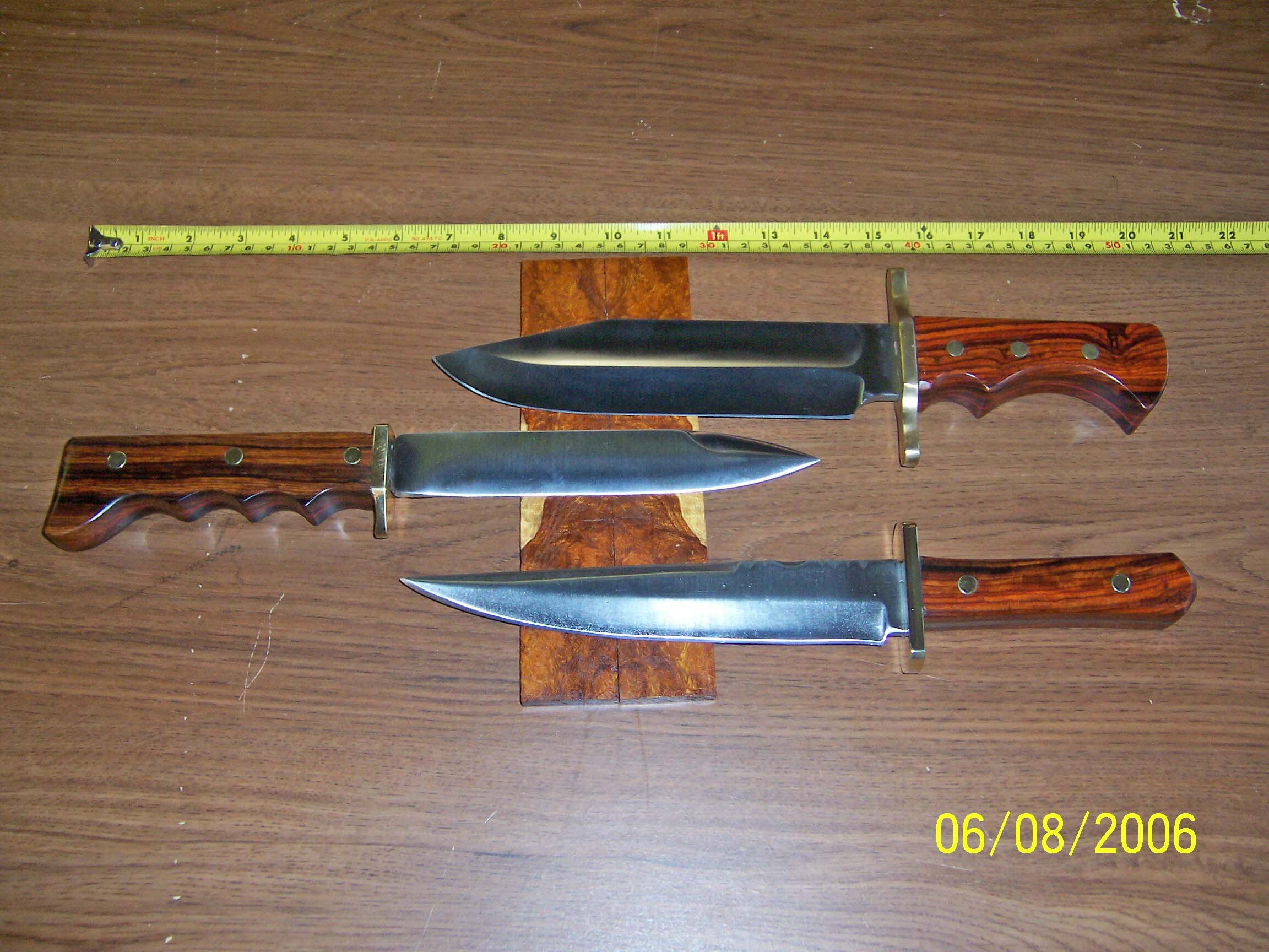 This is a final side view of the three knives with a tape to help establish the scale.