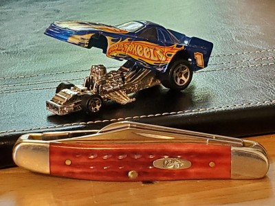 6347 Pocket Worn along side my latest addition to my parking lot - a funny car, shrapnel from a bombing by Scott