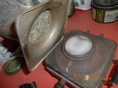 Base of percolator fits over element inside the housing