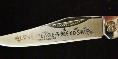 Rough Rider RR1377 Mini-Trapper Pink Handles Peace Sign Shield - Blade Etch.JPG