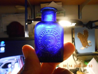 "Skeeter dope" bottle back-lit