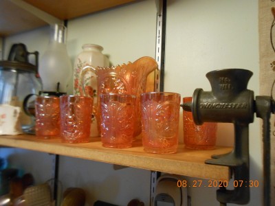 Old orange Carnival Glass (Windmill pattern) also one of my prizes in the Winchester meat grinder.