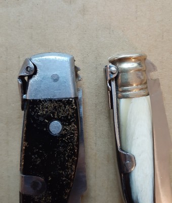 In the Biselcorte knife, the pivot of the palanquillla is recessed into the bolster. Compare to a Spanish Navaja on the right.