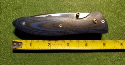 Corby Black n Blue partially Serrated Folder  (2).jpg