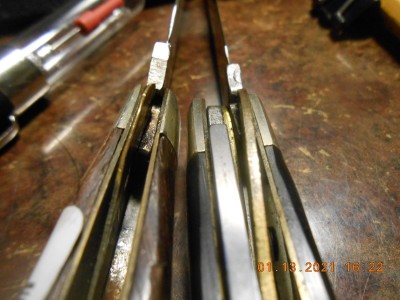 Queen on left 0.017" Camillus 0.045"