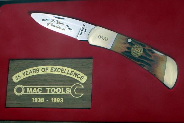 it is in a wall hanging wood case
