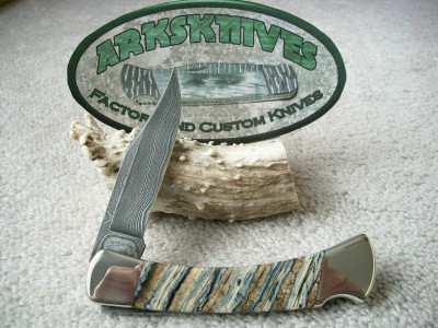 Buck 110 NS Damascus Mammoth Tooth #2.jpg