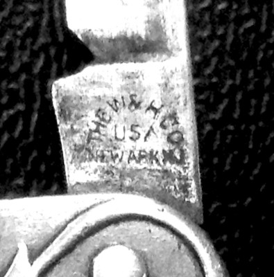 The tang stamp is the curved or arched style<br />tang stamp, WITH the "USA" in the middle.