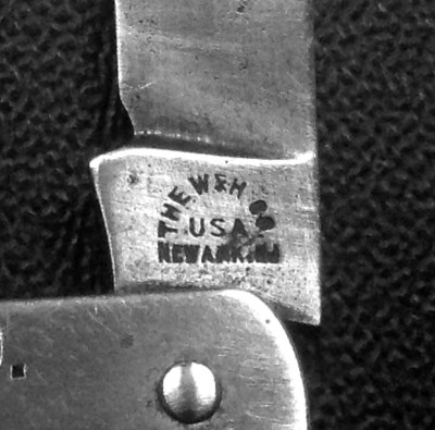 The W &amp; H tang stamp on the same pattern <br />of fob/key ring pocket knife.