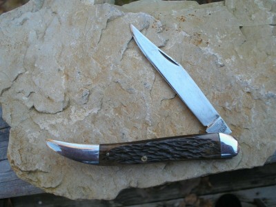 Remington Profile, Modern Handles (?) expand to see tang stamp.