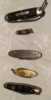 Tree blades is boker Solingen Germany . Good year advertising is E. Bonsmann Solingen Germany on 1 blade and the other have a symbol. The gold one said Sheffield usa. And the smallest just made in Germany