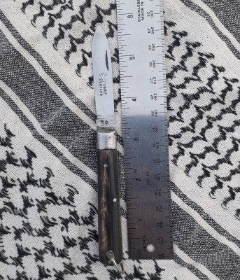 I think the blade is stainless steel, quite shiny and rust free. The tang stamp reads &quot;39&quot; but I don't think that's a date.
