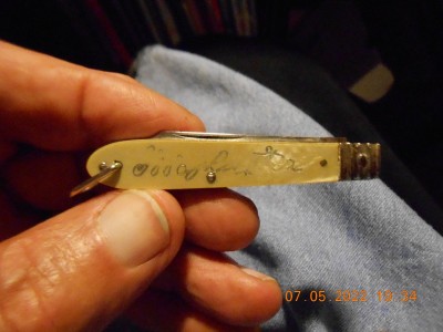 I thought some one had scratched their name on the mark side handle.  Now I see it is Geo. Washington's signature.