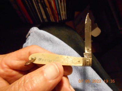 Interesting shaped blade, several rust spots, still okay for fishing in the shallow end of the bay.