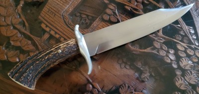 The black spots on the blade was junk in the 440C bar stock I got at a gun/knife show years ago, showed up after heat treat.