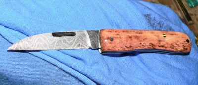 Face side peened and polished.jpg