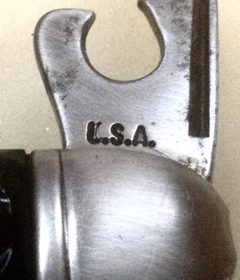 The Can Opener Front Tang Stamp.