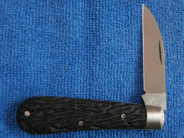 With original black synthetic covers