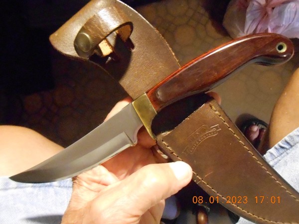 No stamp. Etch on blade is OLSEN/S.