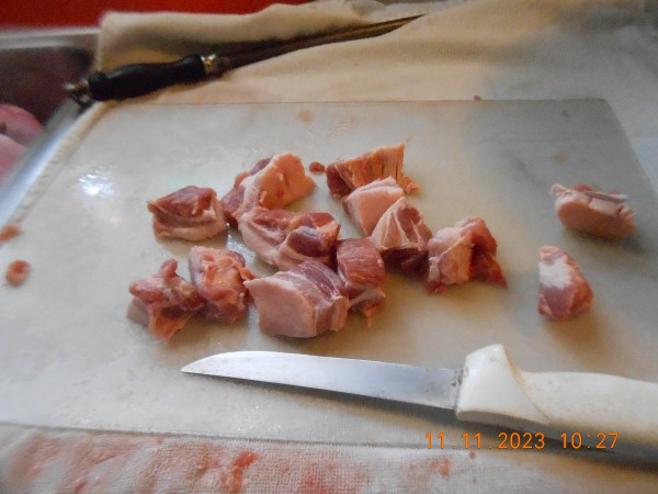 Removed the shoulder blade and cut into small pieces with my Dexter-Russell knife.