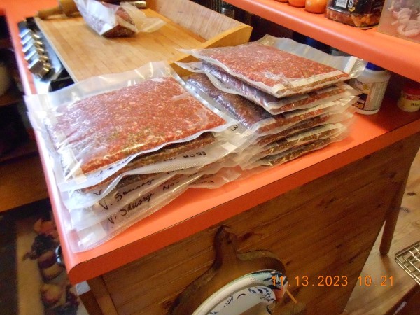 We then use a rolling pin to flatten the packages for stacking in the freezer.