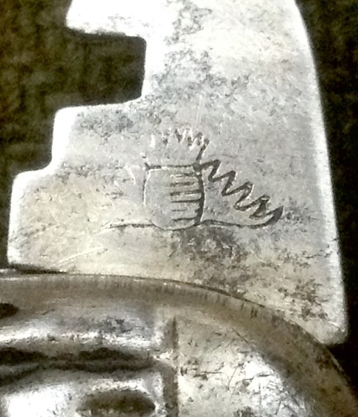 The Glass Cutter Stamp.<br />Plain Symbol Or Logo.