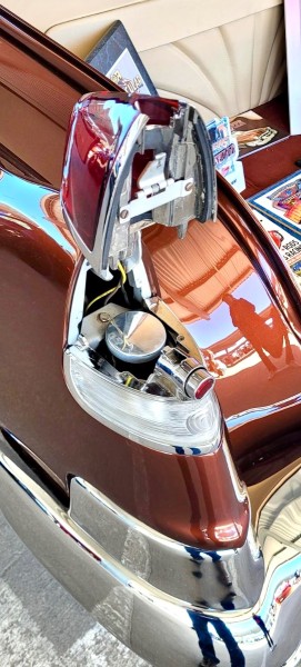 Cadillac hinged tail light hidden gas cap