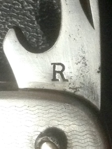 The Cap Lifter Or Bottle Opener Front Tang Stamp.