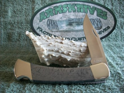 Buck 110 NS M3 Damascus Handles #1b.jpg