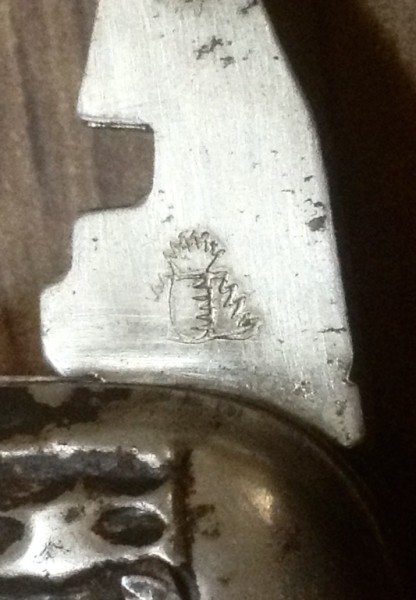 The Glass Cutter Front Stamp.<br />A "Flaming Pineapple"?