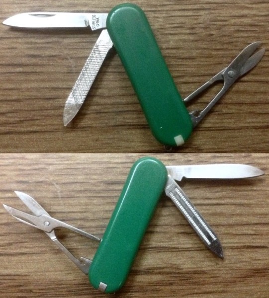 Number 7.<br />The Spring For The Scissors Is Missing.