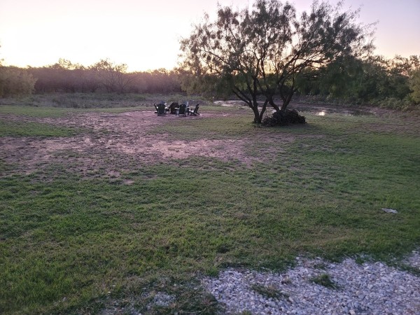 Fire pit and pond in the front yard