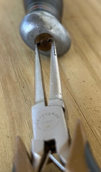 TIGHTENED WITH PLIERS STILL IN-PLACE