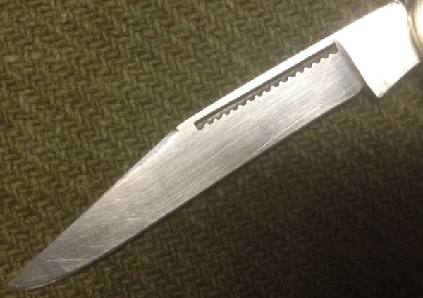 The Almost Invisible Main Blade Front Etch.<br />You Can See It A Little Better In Picture #6.