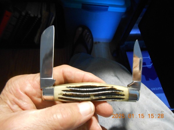Colored as other knives in this condition.