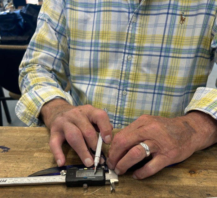 Brian Measuring A Control Line.jpeg