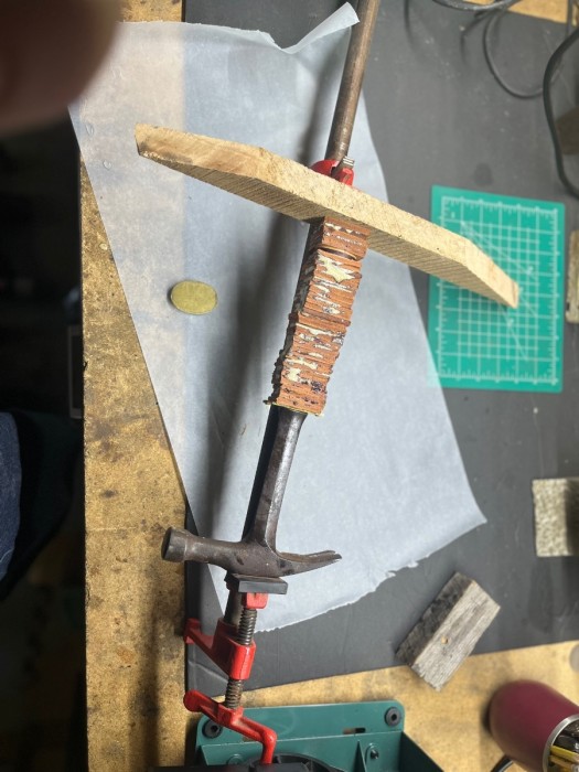 Made a frame with scrap wood to help compress the leather