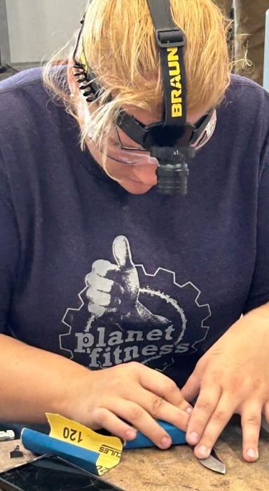Gabby Hand Sanding Her Bevel.jpeg