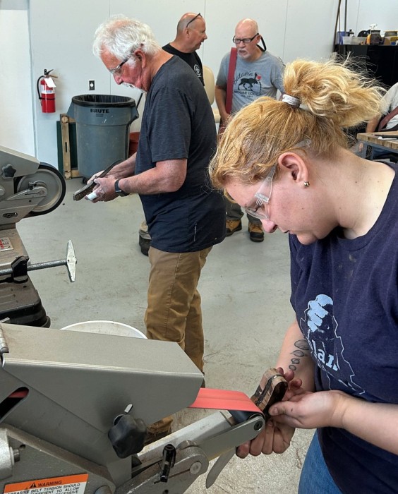Brian and Gabby Shaping Their Covers At The Grinders