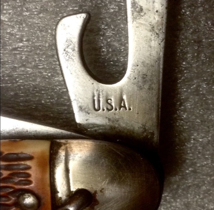 The Can Opener, Back Stamp.