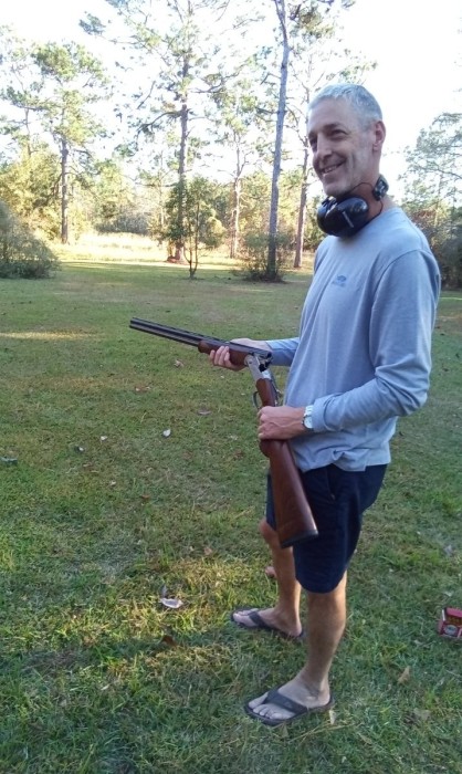 This is our baby boy, Philip Jr.,all 6'4", with his Beretta.
