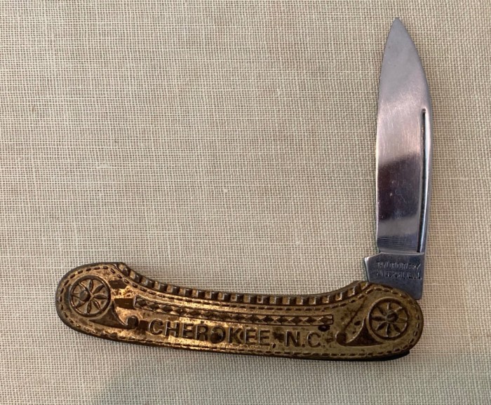 Cherokee, NC souvenir brass canoe