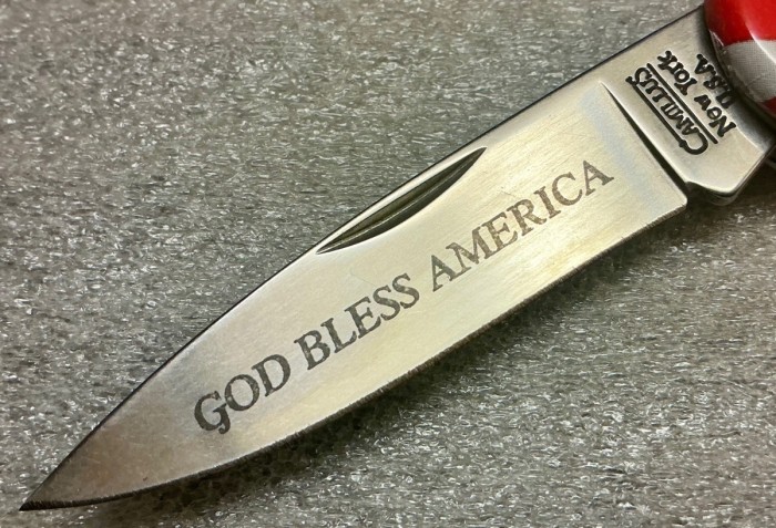 The Main Blade Front Etch.<br />CAMILLUS 907F-"Ol' Glory" Series<br />Pocket Knife #49.
