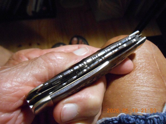 File work on the spines of the blades