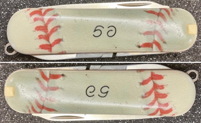 The NON-Main Handle Side - “50”(?) or “eg”(?) or ?