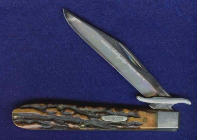 Robeson 512872 4 1/2" Stag Handled<br />Folding Hunter w Folding Guards. Sabre Grind. Etched.