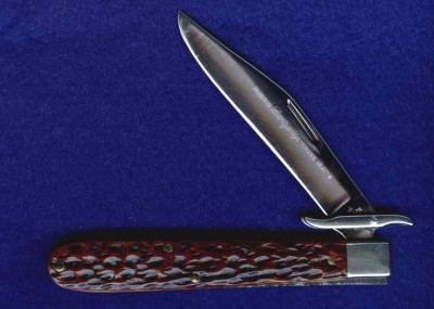 Robeson 612872 4 1/2" Bone Handled<br />Folding Hunter w Folding Guards. Sabre Grind. Etched.