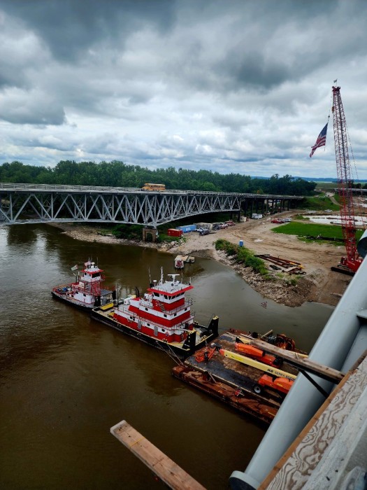 Tugs that move crane platforms to where needed