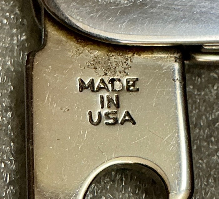 The Cap Lifter Or Bottle Opener/Screwdriver Front Stamp.