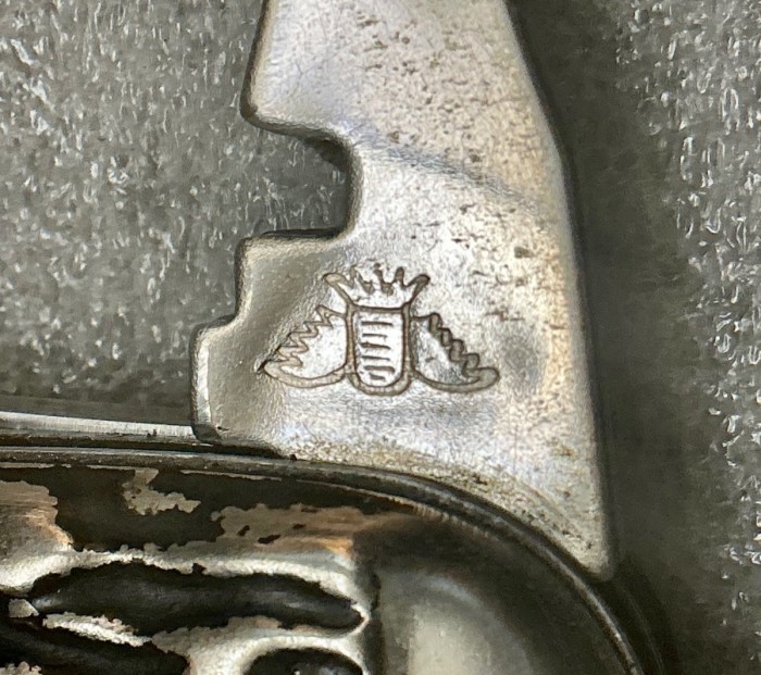 The Glass Cutter Front Stamp.<br />A "Flaming Pineapple"(?)
